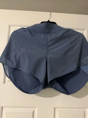 lululemon steel Blue Hotty hot 4 inch inseam size 12 high rise